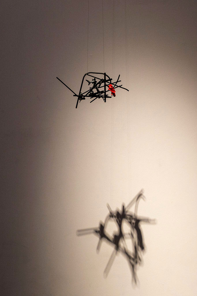 metal sculpture hanging, shadow, The Universe Speaks to You but Only at 4am - About the Art Market, Sweden