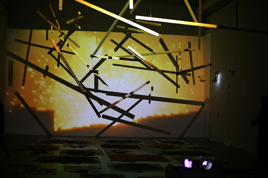 installation with projections of videos from the Afghan-Soviet war, 19791989, Rorschach test like pigment drawings and sound at Swedish art gallery 