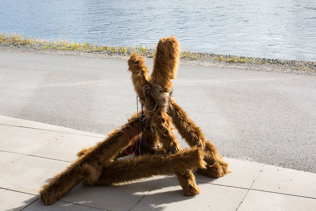 Switch, faux fur object installation in public space by the river, Sweden