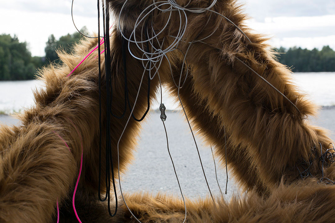 Switch, faux fur object installation in public space by the river, Sweden